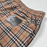 Burberry - check swim shorts beige