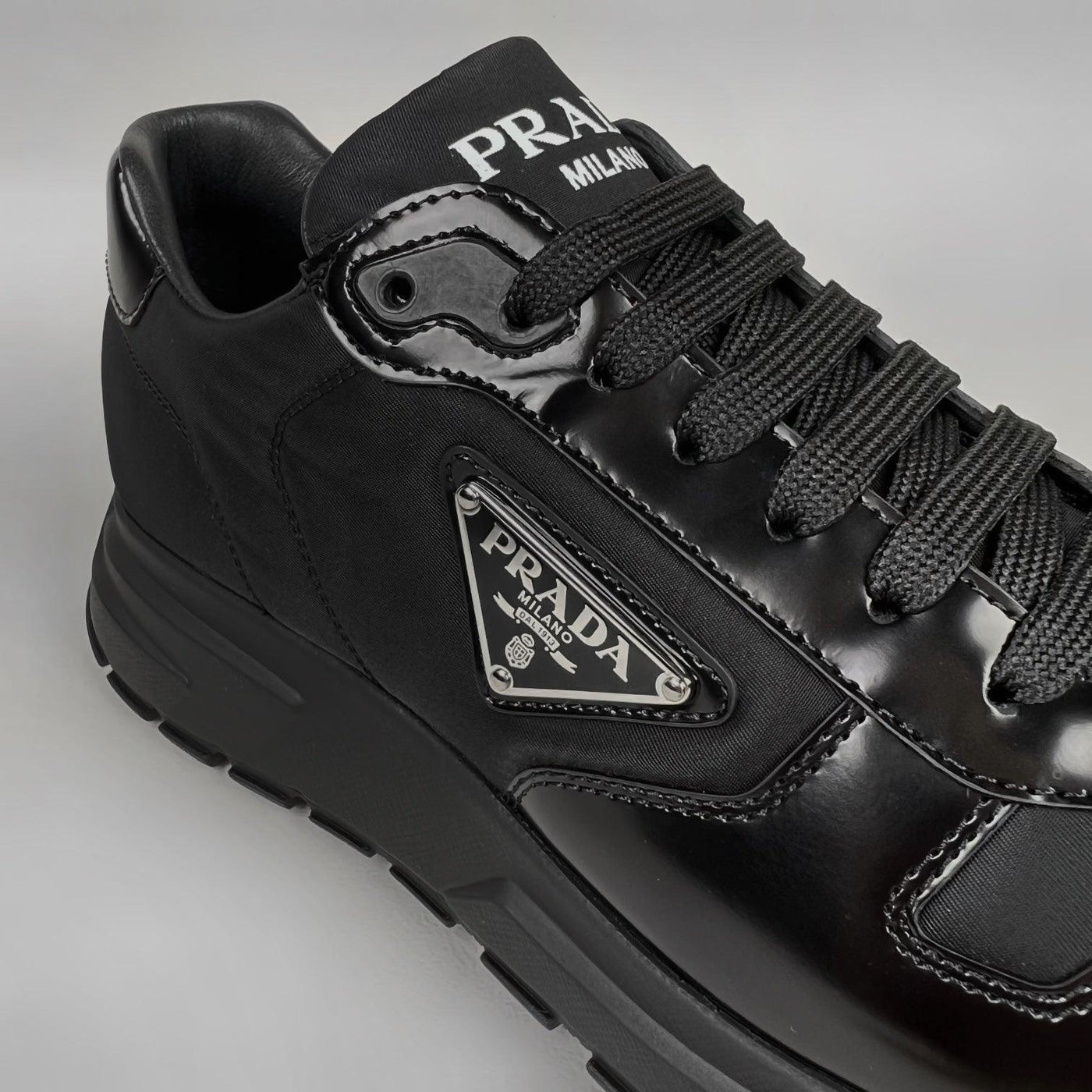 Prada Re-Nylon Appliqué Logo Sneakers Black – Garmz Factory